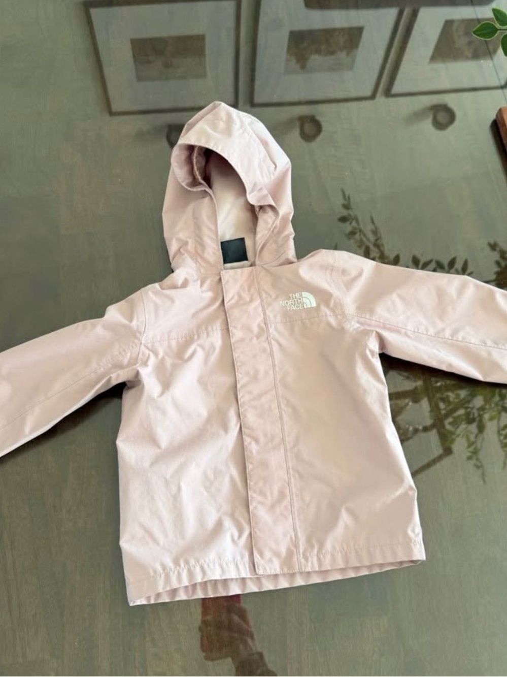 The North Face Light Pink Hooded Rain Jacket for Kids
